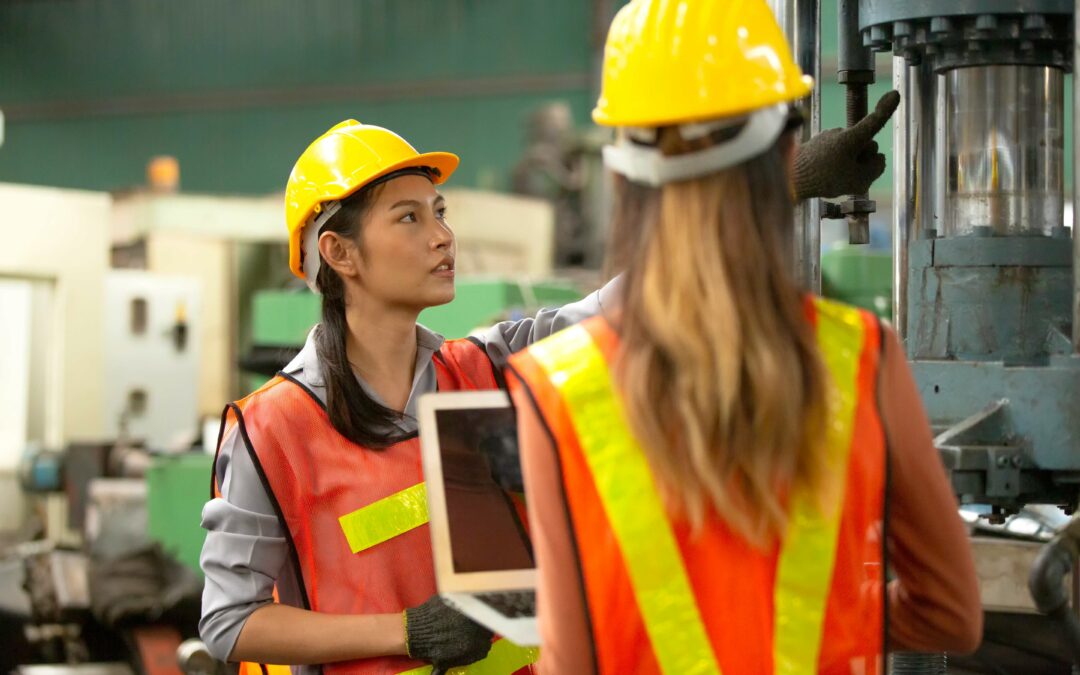 two engineers discussing the MES and electronic work instructions software